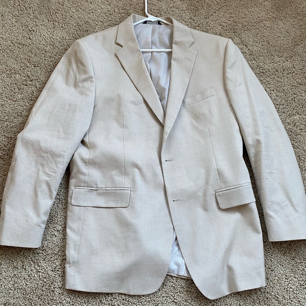Men’s Jos A Bank suit.